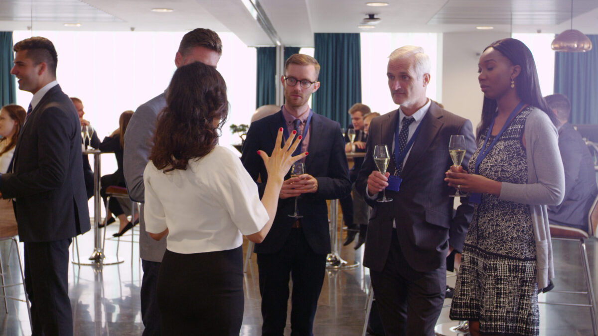 delegates network at conference drinks reception shot on r3d sbi 350954655